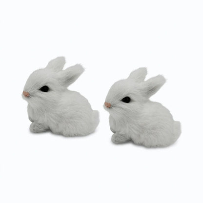 Petit lapin en peluche blanche, forme arrondie facile à saisir