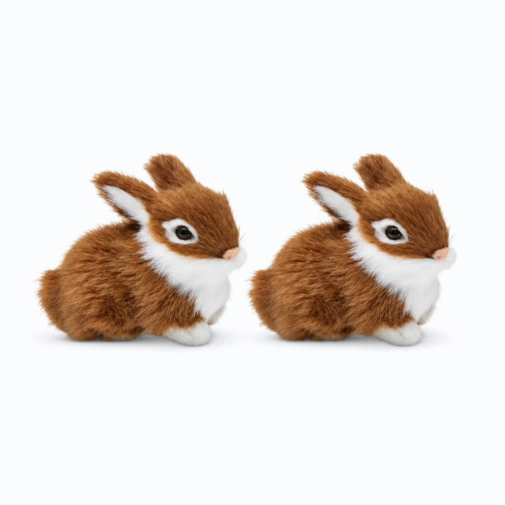 Peluche lapin blanche aux oreilles allongées, texture douce au toucher