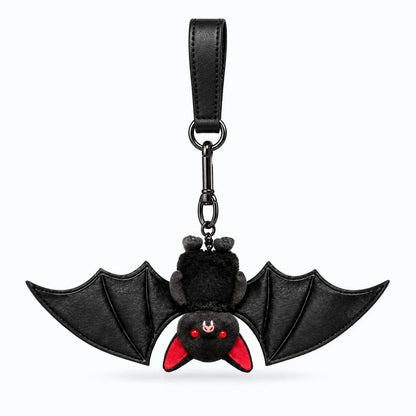 Porte clés doudou rond et doux au toucher, silhouette noire