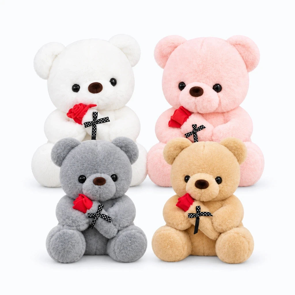 Ours peluche de couleur rose posé en décoration sur une surface