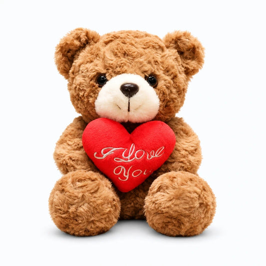 Ourson en peluche assis marron avec cœur rouge brodé et rose décorative
