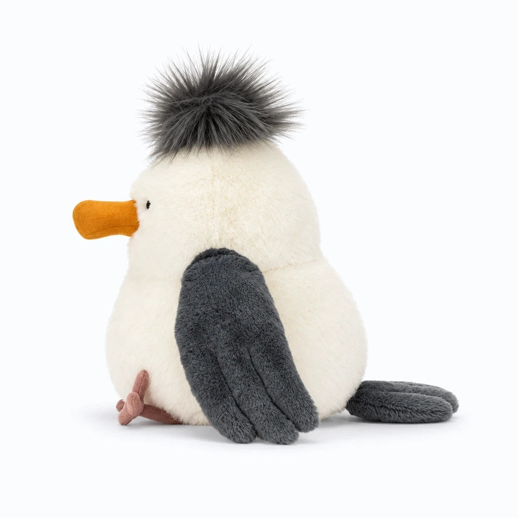 Doudou oiseau mouette en textile souple rembourré, format compact pour enfant