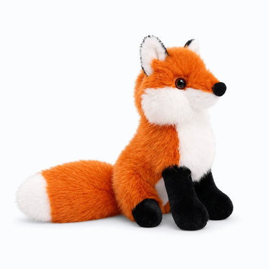Peluche renard aux formes arrondies avec pelage moelleux et museau délicat
