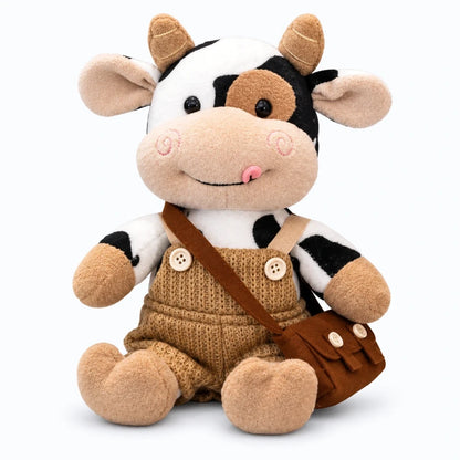 Vache en peluche allongée sur un lit, idéale pour la décoration de chambre d'enfant